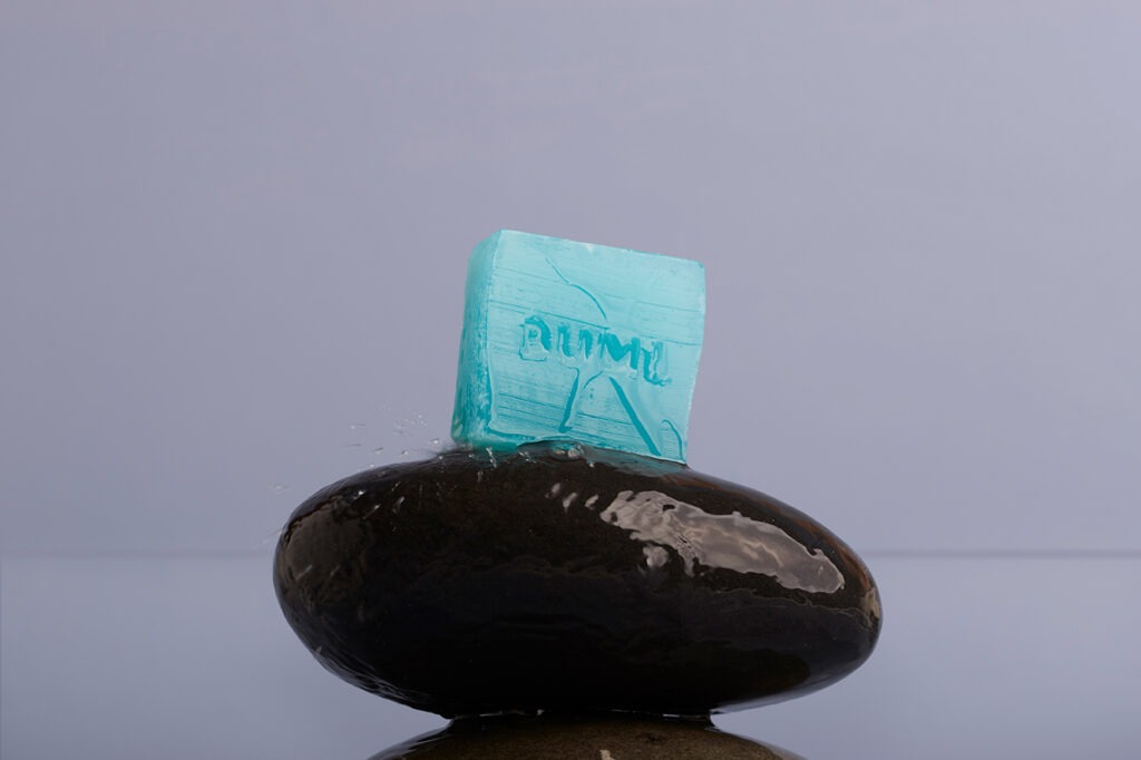 Bumi Bars natural soap photography - ingredient-focused composition with harmonious color palette
